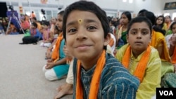 FILE - Devotees participate in events at the Karya Siddhi Hanuman Temple in 2015 that serves the Asian-Indian community in Frisco, Texas. Immigrants from China and India, many with student or work visas, have overtaken Mexicans as the largest groups coming into the U.S., according to the U.S Census Bureau.