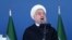 Iran's President Hassan Rouhani speaks at a military parade marking National Army Day in front of the mausoleum of the late revolutionary founder Ayatollah Khomeini, just outside Tehran, April 17, 2016.