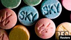 Ecstasy pills, which contain MDMA as their main chemical, are pictured in this undated handout photo courtesy of the United States Drug Enforcement Administration (DEA). 