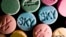 FILE - Ecstasy pills, which contain MDMA as their main chemical, are pictured in this undated handout photo courtesy of the US Drug Enforcement Administration.