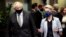 FILE - European Commission President Ursula von der Leyen welcomes British Prime Minister Boris Johnson in Brussels, Belgium, Dec. 9, 2020.