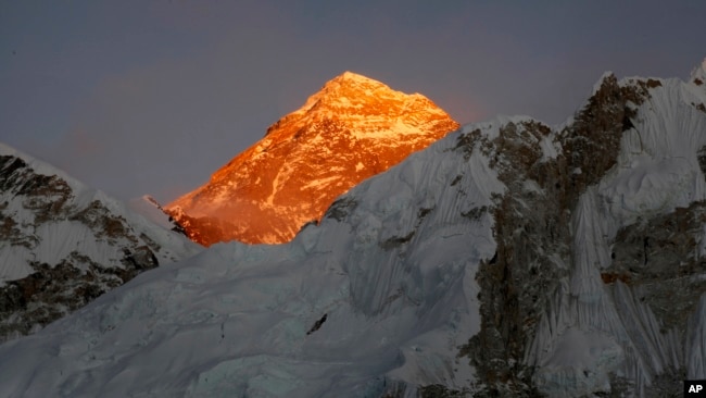 FILE- In this Nov. 12, 2015 file photo, Mount Everest is seen from the way to Kalapatthar in Nepal.