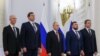 Russian President Vladimir Putin and the Russian-installed leaders in Ukraine's Donetsk, Luhansk, Kherson and Zaporizhzhia regions, attend a ceremony to declare the annexation of the territories, Moscow, Russia, September 30, 2022. 