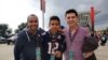 Fans proudly display their tickets to the Super Bowl -- where the cheapest "get-in" ticket will go for around $2,000. (B. Allen/VOA)