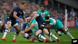 FILE — South Africa's starting hooker Malcom Marx, drops the ball after he was tackled by Scotland's David Cherry during the Rugby World Cup at the Stade de Marseille in France, Sept. 10, 2023. 