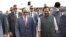 Egyptian President Abdel-Fattah el-Sissi, center left is received by Indian Junior Minister for Minority Affairs and Parliamentary Affairs Mukhtar Abbas Naqvi, right upon arrival at the airport in New Delhi, India, Thursday, Sept.1, 2016.