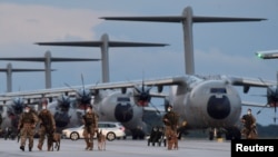 German troops return to Wunstorf Air Base following evacuation missions in Kabul, Wunstorf, Germany Aug. 27, 2021. 