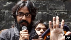 Indian political cartoonist Aseem Trivedi speaks after he was released from jail on bail in Mumbai, India, September 12, 2012.