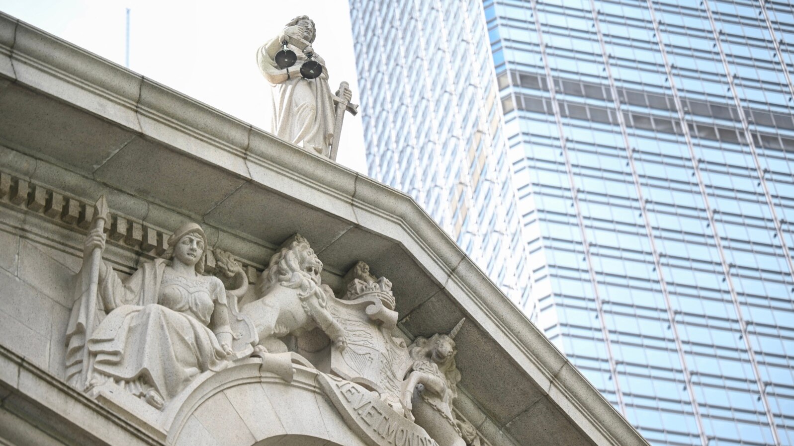 FILE - The scales of justice are seen on top of the Court of Final Appeal in Hong Kong on June 24, 2024. A British justice has become the fifth foreign judge to step down from the Court of Final Appeal this year. 