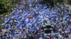 People demonstrate during a protest against Nicaraguan President Daniel Ortega's government in Managua on September 16, 2018. (INTI OCON/AFP)