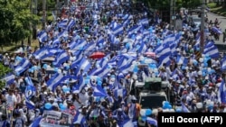 People demonstrate during a protest against Nicaraguan President Daniel Ortega's government in Managua on September 16, 2018. (INTI OCON/AFP)