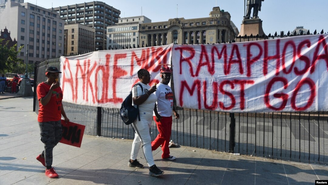 Members of the political party Economic Freedom Fighters (EFF) gather at Church Square after calling for a "National Shutdown" and demanding that President Cyril Ramaphosa resigns in Pretoria, South Africa March 20, 2023. 