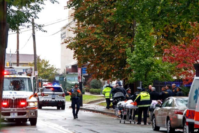 First responders surround the Tree of Life Synagogue where a shooter opened fire Saturday, Oct. 27, 2018, wounding three police officers and causing "multiple casualties" according to Police.