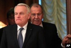 Russian Foreign Minister Sergey Lavrov, right, meets with French Foreign Affairs Minister Jean-Marc Ayrault in Moscow, Russia, on October 6, 2016.