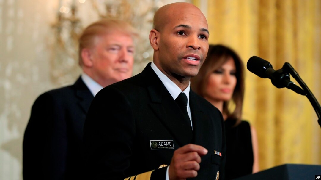 FILE - Surgeon General Jerome Adams speaks at the White House in Washington, Feb. 13, 2018. Adams is expected to speak about a public health advisory regarding an opioid overdose antedote Thursday at the National Rx Drug Abuse & Heroin Summit in Atlanta.
