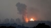 Fire and smoke rise following an Israeli airstrike in the Gaza Strip, as seen from southern Israel, on Oct. 28, 2023.