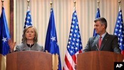 U.S. Secretary of State Hillary Rodham Clinton and Kosovo's Prime Minister Hashim Thaci give a press conference in Pristina, Kosovo, 13 Oct. 2010