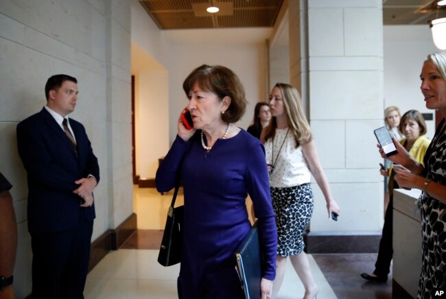 Sen. Susan Collins, R-Maine, arrives to view the FBI report on sexual misconduct allegations against Supreme Court nominee Brett Kavanaugh, on Capitol Hill, Oct. 4, 2018 in Washington.