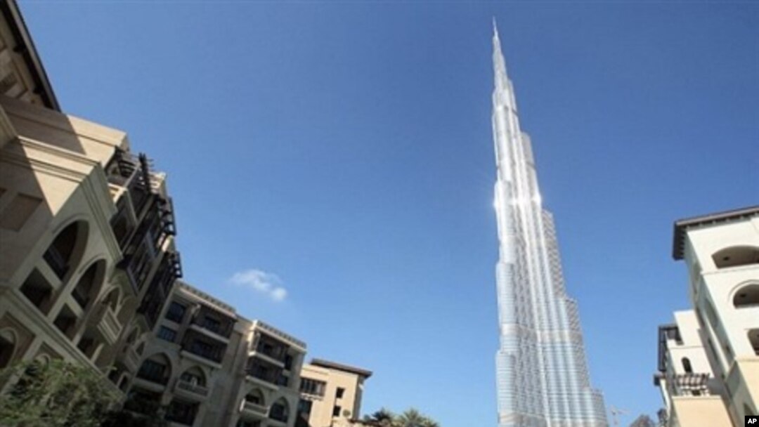 Burj Khalifa, the world's tallest building, seen at center, in Dubai, United Arab Emirates, Sunday, 3 Jan. 2010
