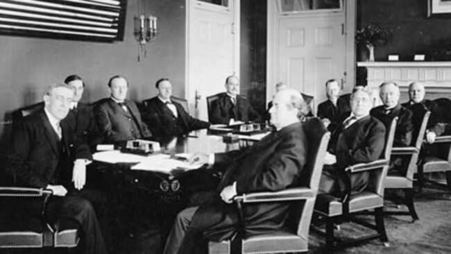 Woodrow Wilson and his cabinet seated around table, 1913