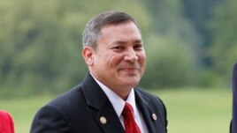 Guam Gov. Eddie Calvo is pictured at Buckingham Palace in London for a reception prior to the London Olympics, July 27, 2012.