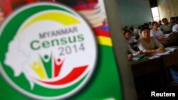 Volunteers attend a census training course at a school in Rangoon, March 23, 2014. 