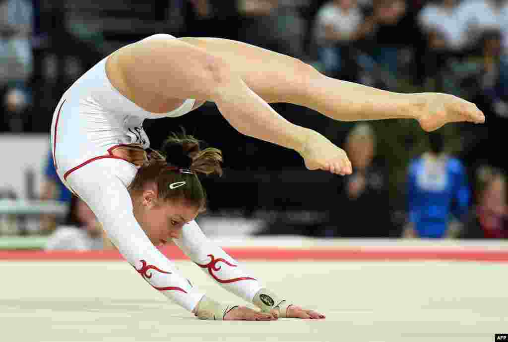 Swiss gymnast Caterina Barloggio competes in the floor exercice event of the European Women's Artistic Gymnastics Championships in Montpellier, southern France.