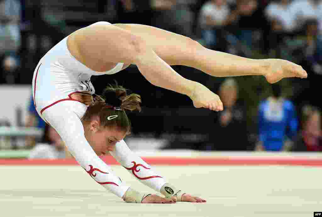 Swiss gymnast Caterina Barloggio competes in a qualifying round of the floor exercise event of the European Women&#39;s Artistic Gymnastics Championships in Montpellier, southern France.