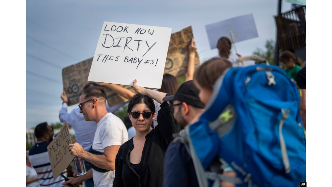 FILE - Residents of the Blairgowrie neighborhood of Johannesburg, South Africa, demonstrate against the lack of water on March 12, 2024.