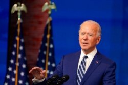 President-elect Joe Biden speaks during an event to announce his choice of retired Army Gen. Lloyd Austin to be secretary of defense, at The Queen theater in Wilmington, Del., Dec. 9, 2020.