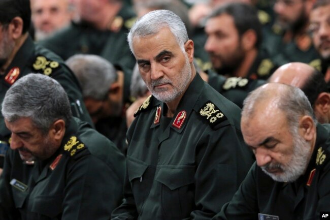 FILE - Revolutionary Guard Gen. Qassem Soleimani, center, attends a meeting with Supreme Leader Ayatollah Ali Khamenei and Revolutionary Guard commanders in Tehran, Iran, in this Sept. 18, 2016 photo released by an official website of the office of the Iranian supreme leader.