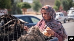 Yazidis in Khanke in the Duhok area of the Kurdistan region of Iraq, prepare to return to their homes in Sinjar, June 24, 2024.