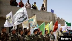 Syrian Democratic Forces (SDF) spokesman Talal Silo speaks during a news conference in Hukoumiya village in Raqqa, Syria, June 6, 2017.