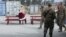 A U.S. soldier dressed as Santa Claus waves to fellow troops on Christmas day at the U.S. air base in Bagram, north of Kabul, Afghanistan.