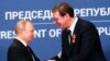 FILE - Russian President Vladimir Putin, left, shakes hands with Serbian President Aleksandar Vucic in Belgrade, Serbia, Jan. 17, 2019.