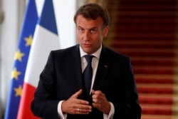 French President Emmanuel Macron speaks after a video-conference summit on vaccination at the Elysee Palace in Paris, May 4, 2020.