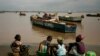 Vendedoras de peixe na praia de Lombolombo em Cabinda