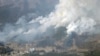 FILE - An aerial views shows a forest fire on a mountain in Ofunato, Iwate Prefecture, northeastern Japan, February 28, 2025, in this photo taken by Kyodo. Mandatory credit Kyodo/via REUTERS 