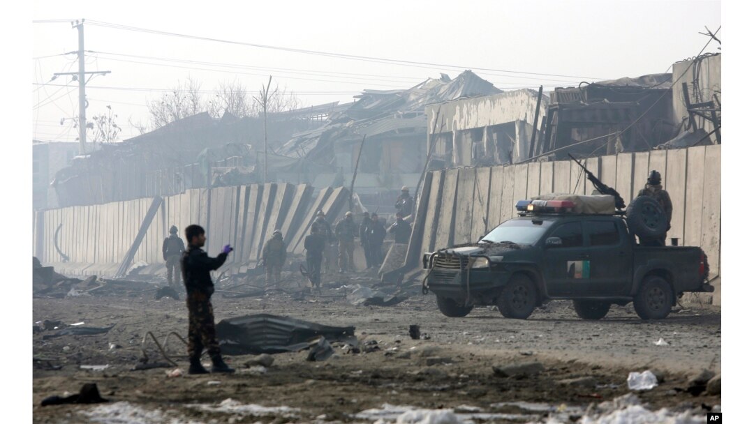 Afghan security forces man at the site a day after an attack in Kabul, Jan. 15, 2019.