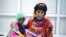 Saida Ahmad Baghili, 18, sits next to her relative at the al-Thawra hospital where she receives treatment for severe acute malnutrition in the Red Sea port city of Houdieda, Yemen, Oct. 25, 2016. 