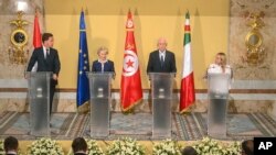 Netherlands' Prime Minister Mark Rutte, Tunisian President Kais Saied, centre right, European Commission President Ursula von der Leyen, centre left and Italian Prime Minister Giorgia Meloni, at the presidential palace in Carthage, Tunisia, Sunday, July 16, 2023