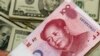 Tajuk Harian Pemerintah Tiongkok Anjurkan Pengambangan Nilai Yuan