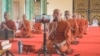 FILE: Monks at Wat Kol Tor Teng at Phnom Penh's outskirts take part in a national blessing ceremony to bless all Cambodian amid coronavirus pandemic, in Phnom Penh, Cambodia, Monday, March 13, 2020. (Khan Sokummono/VOA Khmer)