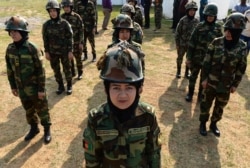 Afghan women army cadets stand in formation during a practice session in Chennai, India, on Dec. 19, 2018.