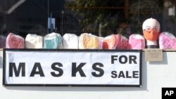Face masks on sale at Muizenberg, Cape Town, South Africa, Tuesday June 16, 2020. The country now has more than a quarter of the coronavirus cases on the 54-nation African continent with more than 73,000 cases after new, record-high infections were…
