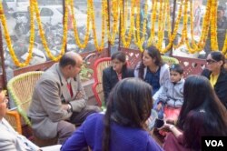 Acid attack survivors, friends and well wishers gather for the anniversary celebrations of the Sheroes Hangout cafe. (A. Pasricha for VOA)