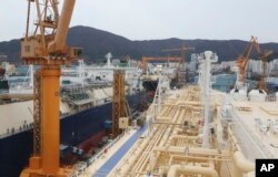 Liquefied natural gas (LNG) carriers are being constructed at the Daewoo Shipbuilding and Marine Engineering facility in Geoje Island, South Korea, Dec. 7, 2018. More than half of the 35 vessels scheduled for delivery in 2018 were LNG carriers.