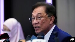 Malaysia's opposition leader Anwar Ibrahim speaks during a press conference in Kuala Lumpur, Sept. 23, 2020. Anwar said he has secured a majority in parliament to form a new government that is “strong, stable and formidable."