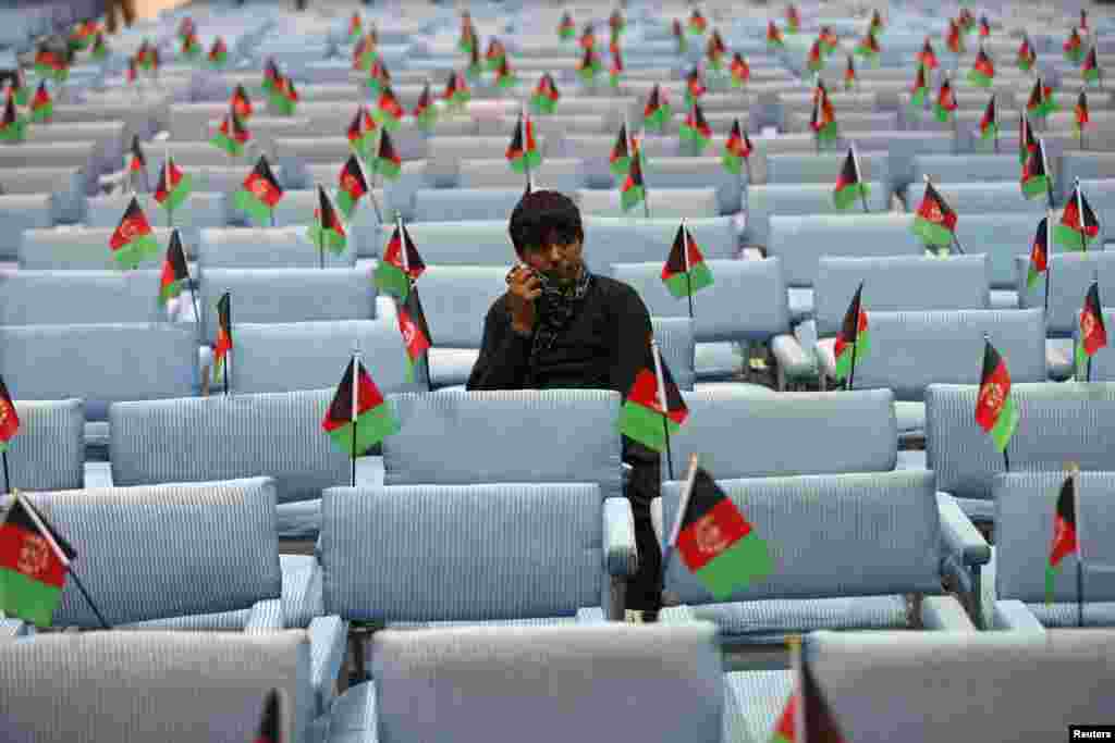 A supporter of Afghan presidential candidate Abdullah Abdullah attends the last day of the election campaigns in Kabaul.