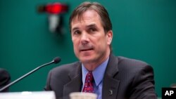 Michigan Department of Health and Human Services Director Nick Lyon testifies on Capitol Hill in Washington, April 13, 2016, before a House joint subcommittee hearing on the ongoing Flint lead-contamination water crisis.